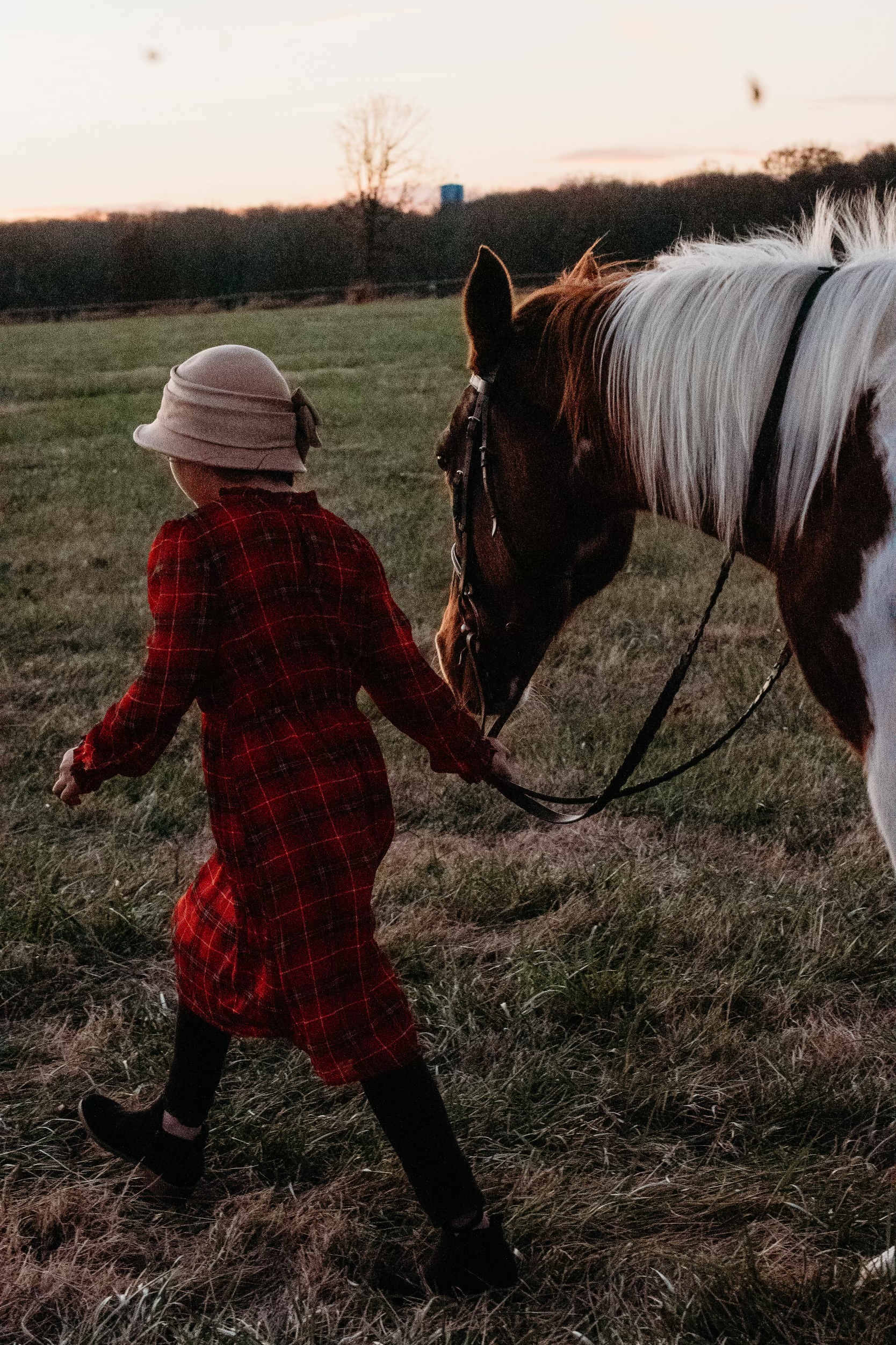 Girl walking a horse through Reins of Opportunity